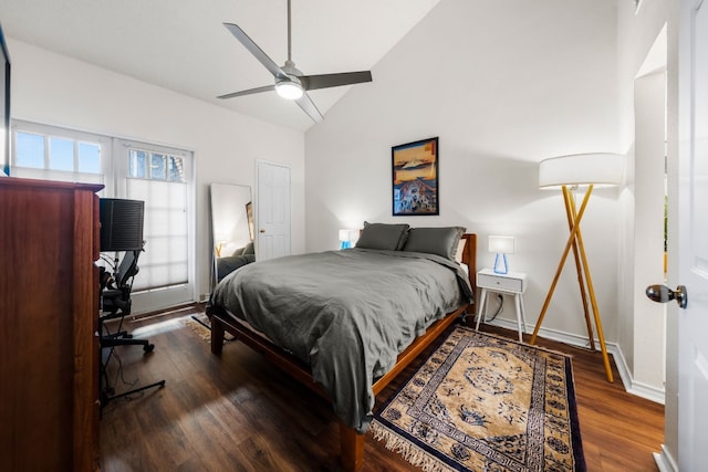 bedroom featuring lofted ceiling, dark wood-type flooring, and ceiling fan