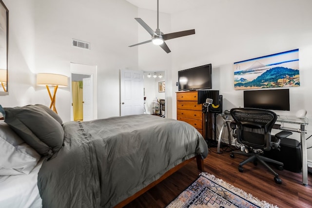 bedroom featuring high vaulted ceiling, hardwood / wood-style floors, and ceiling fan