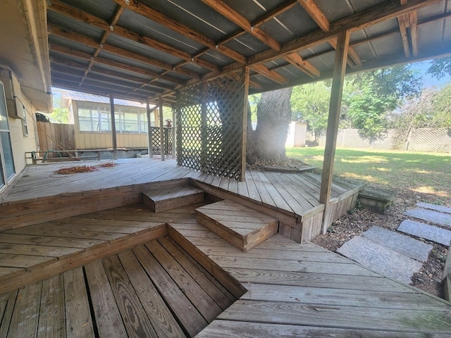 wooden deck with a yard