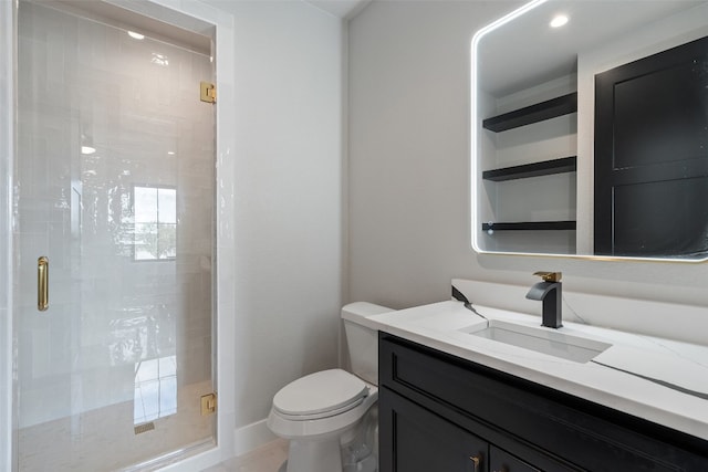 bathroom with walk in shower, vanity, and toilet