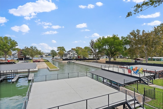 dock area with a water view