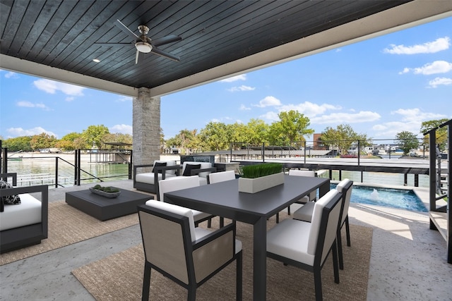 view of patio / terrace with a fenced in pool, outdoor lounge area, and ceiling fan