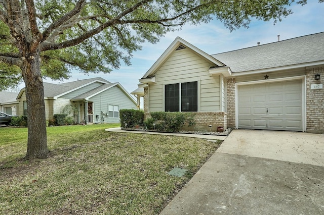 single story home featuring a garage and a front yard