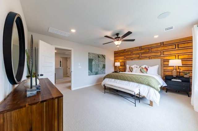 bedroom with ceiling fan and carpet floors