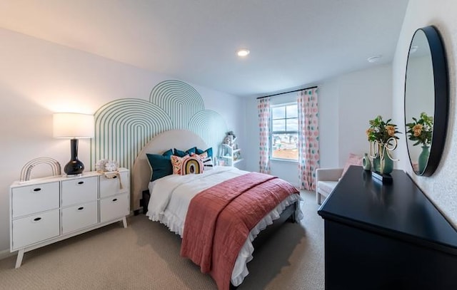 bedroom featuring light colored carpet