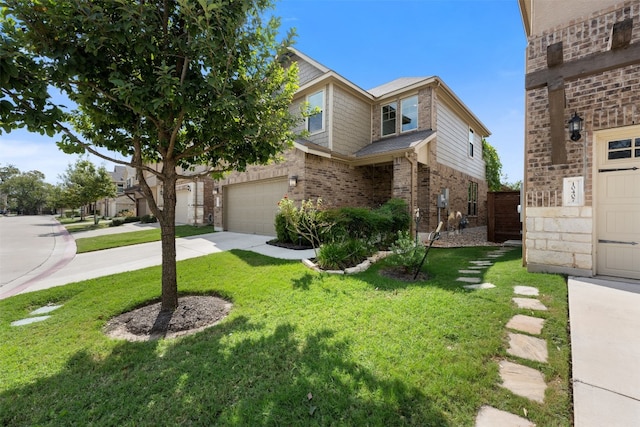 view of front of property featuring a garage and a front lawn