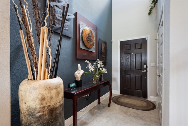 foyer with tile patterned flooring