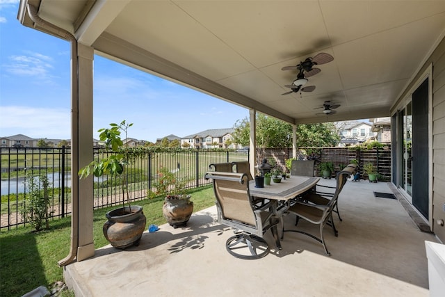 view of patio featuring ceiling fan