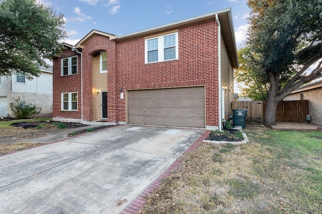 view of front of property featuring a garage