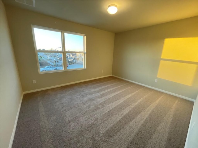 empty room featuring carpet