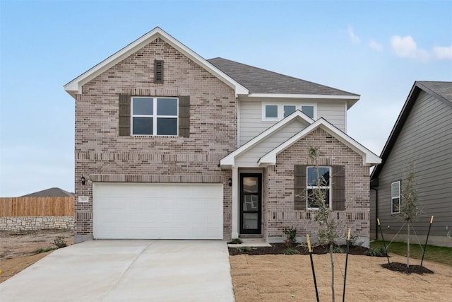 view of front property with a garage