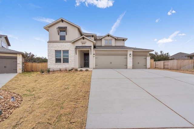 132 Scenic Hills Cir, Georgetown, TX 78628 - view of front of house with stone siding, concrete driveway, stucco siding, and an attached garage