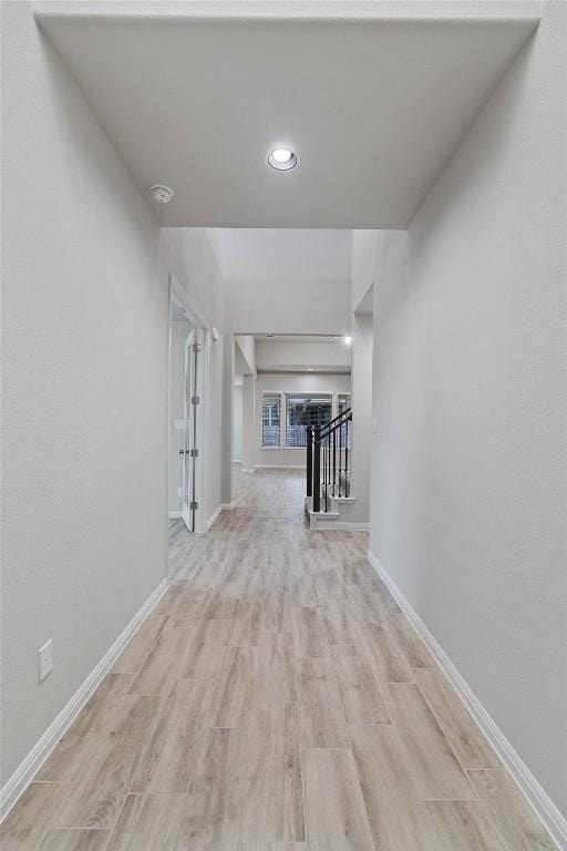 132 Scenic Hills Cir, Georgetown, TX 78628 - hall featuring baseboards, light wood-style flooring, and recessed lighting