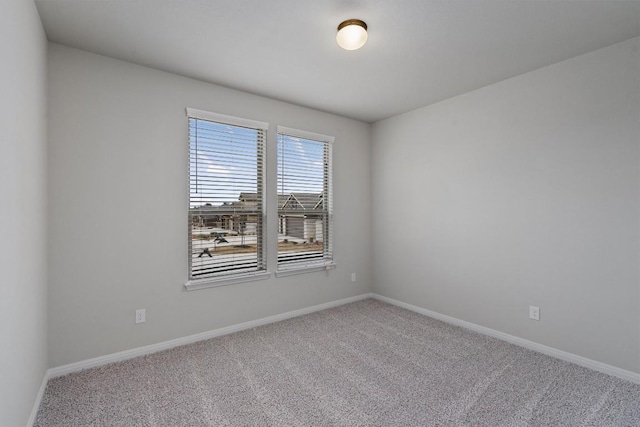 132 Scenic Hills Cir, Georgetown, TX 78628 - carpeted empty room with baseboards