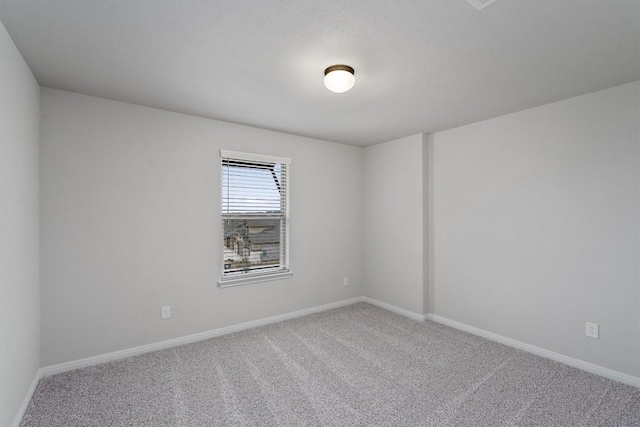 132 Scenic Hills Cir, Georgetown, TX 78628 - spare room featuring carpet floors and baseboards