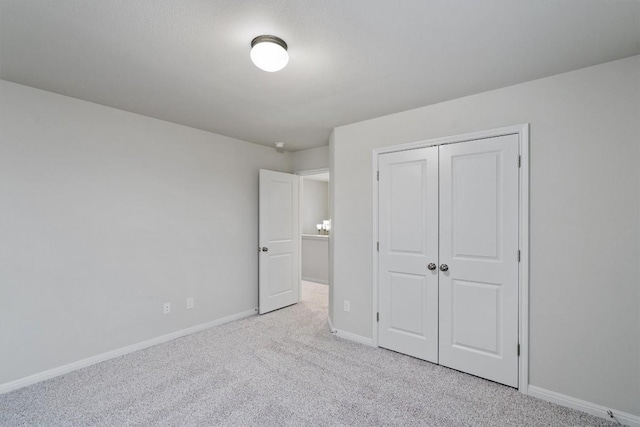 132 Scenic Hills Cir, Georgetown, TX 78628 - unfurnished bedroom featuring carpet floors, baseboards, and a closet
