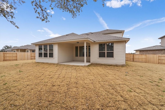 132 Scenic Hills Cir, Georgetown, TX 78628 - rear view of property featuring a patio, a fenced backyard, and roof with shingles