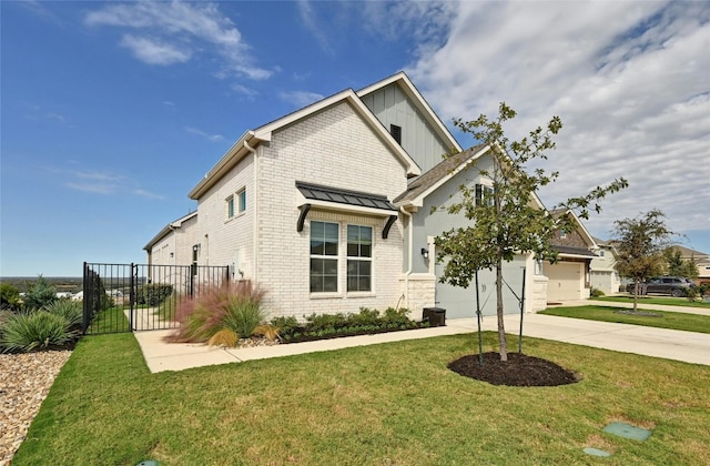 craftsman inspired home with a garage and a front yard