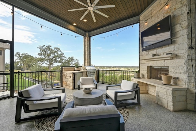 view of patio / terrace featuring a grill, a balcony, ceiling fan, and an outdoor living space