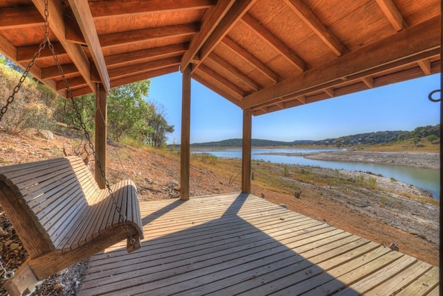 deck featuring a water view