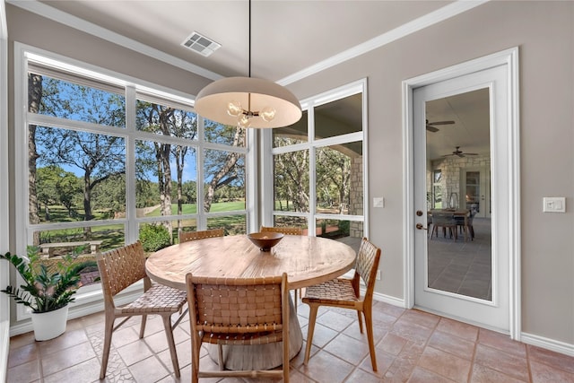 sunroom featuring ceiling fan