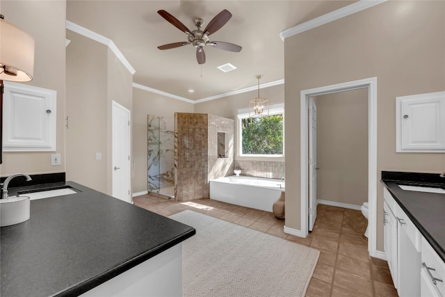 full bathroom featuring tile patterned flooring, ornamental molding, ceiling fan, vanity, and plus walk in shower