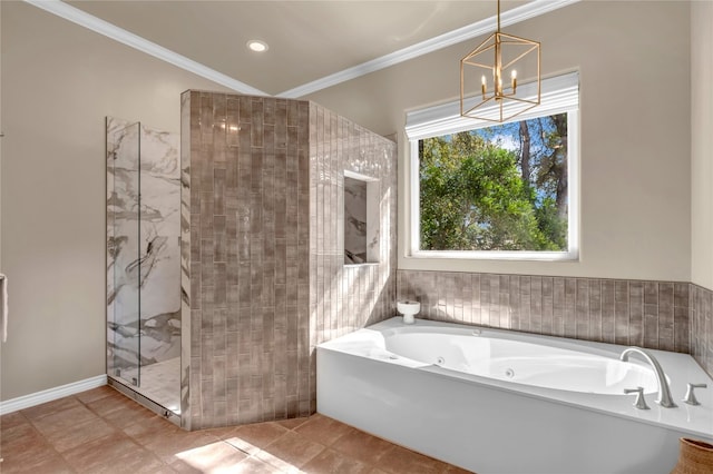 bathroom featuring tile patterned flooring, shower with separate bathtub, crown molding, and an inviting chandelier