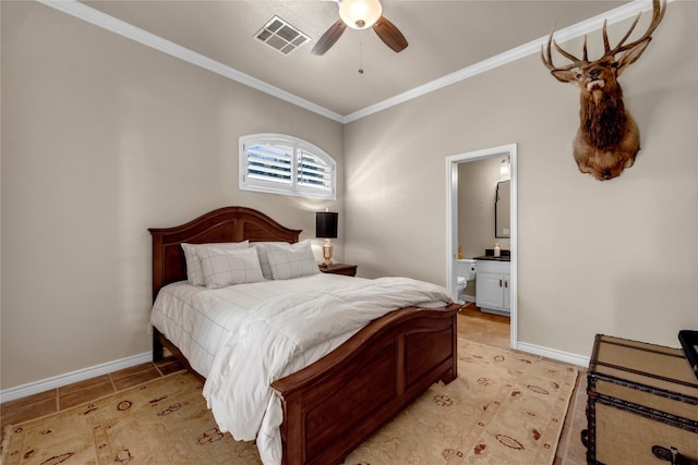 tiled bedroom featuring ceiling fan, crown molding, and connected bathroom