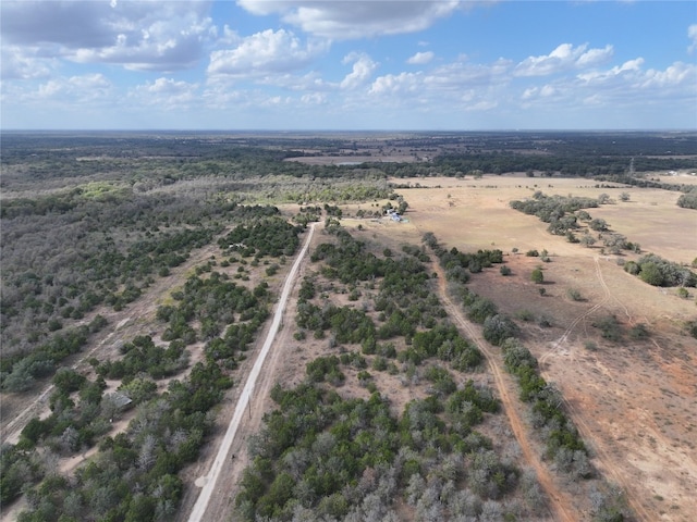 birds eye view of property featuring a rural view