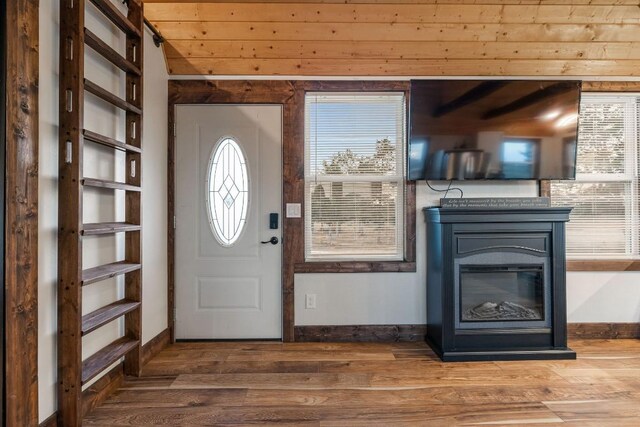 foyer with wood ceiling and hardwood / wood-style floors