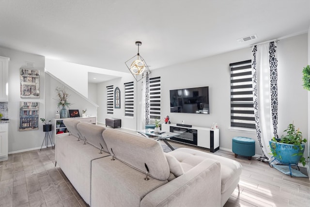 living room with light hardwood / wood-style flooring