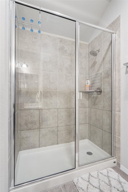 bathroom featuring an enclosed shower