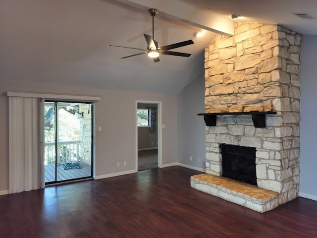 unfurnished living room with vaulted ceiling with beams, dark hardwood / wood-style floors, a fireplace, and ceiling fan