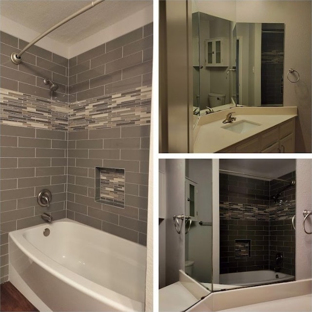 full bathroom with vanity, hardwood / wood-style flooring, tiled shower / bath combo, toilet, and a textured ceiling