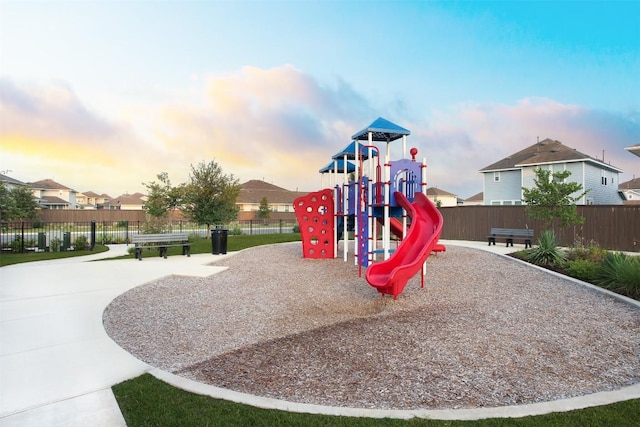 view of playground at dusk