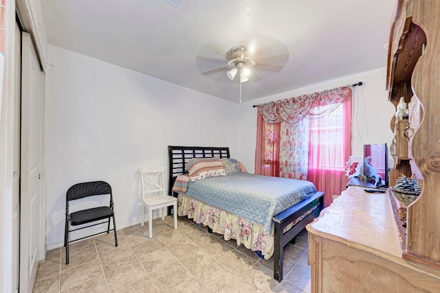 bedroom featuring a closet and ceiling fan