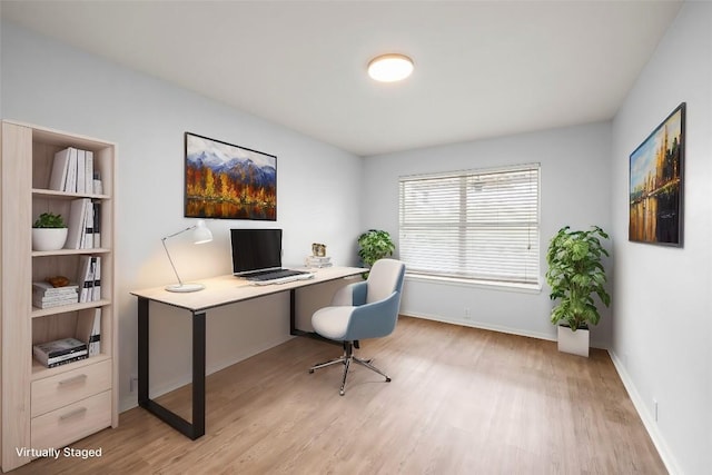 office space featuring light hardwood / wood-style floors