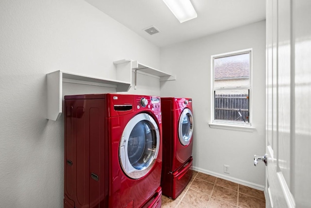 laundry area featuring separate washer and dryer