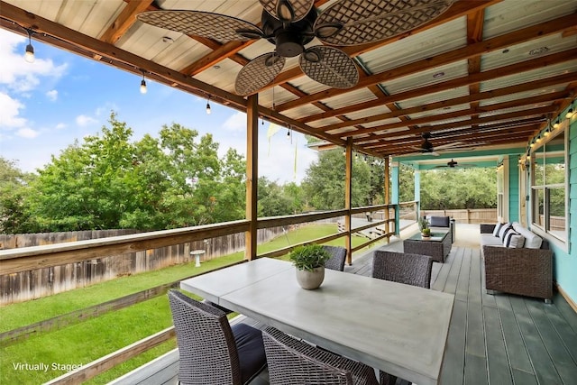 wooden deck featuring outdoor lounge area