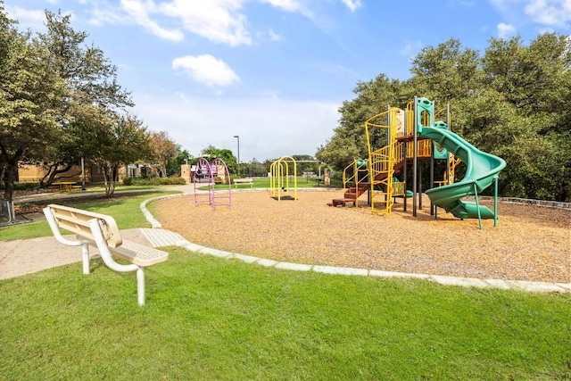 view of playground with a yard