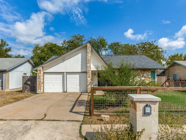 view of front of property featuring a garage