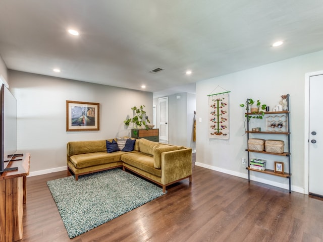 living room with wood-type flooring