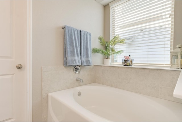 bathroom with a washtub