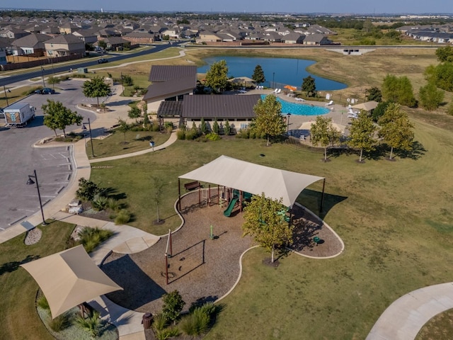 drone / aerial view with a water view