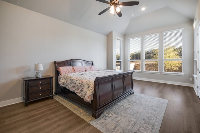 bedroom with lofted ceiling, ceiling fan, and dark hardwood / wood-style floors