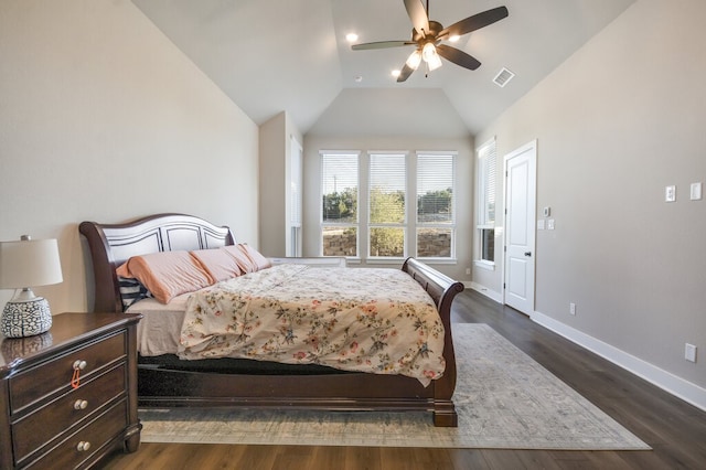 bedroom featuring ceiling fan, vaulted ceiling, and dark hardwood / wood-style floors