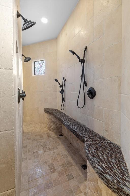 bathroom featuring tiled shower