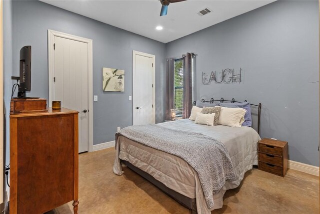 bedroom featuring light carpet and ceiling fan