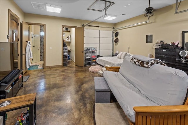 garage with visible vents and baseboards