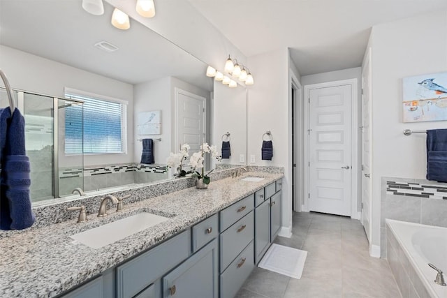 bathroom with tile patterned floors, vanity, and plus walk in shower